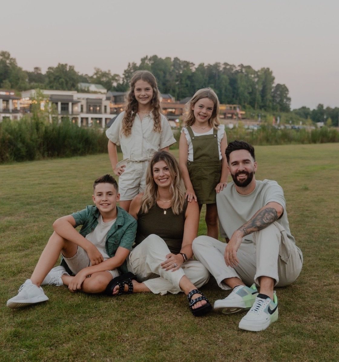 Ps Ryan and Lindsey Rolls with their family, near Avalon in Alpharetta