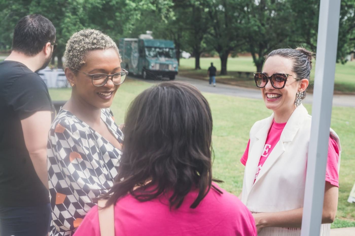 A warm outdoor community gathering with a food truck at Futures Kennesaw