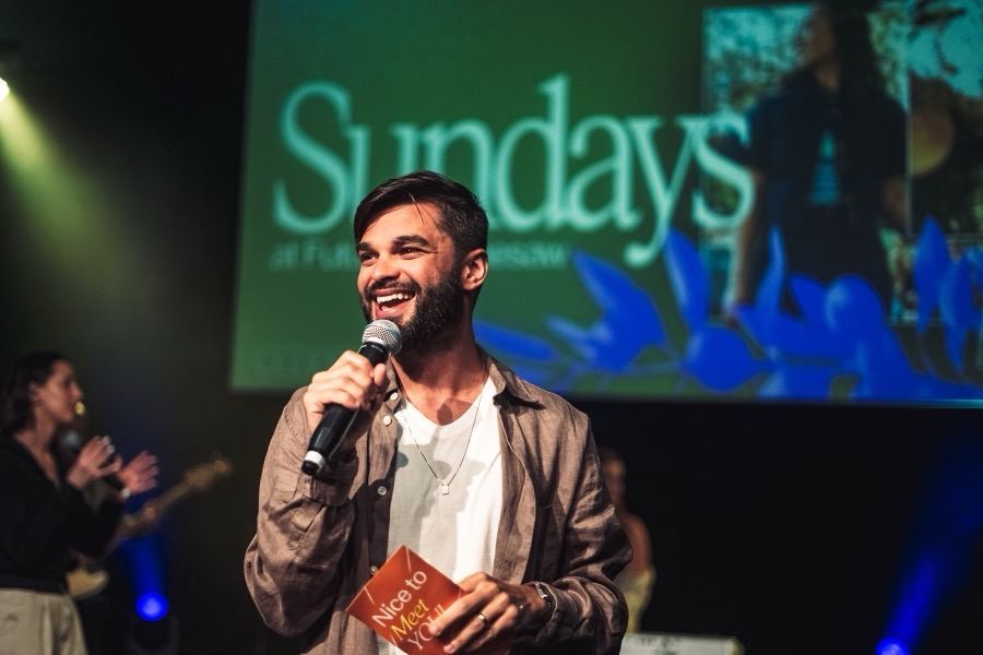 A joyful welcome — 'nice to meet you' — from the stage at Futures Kennesaw